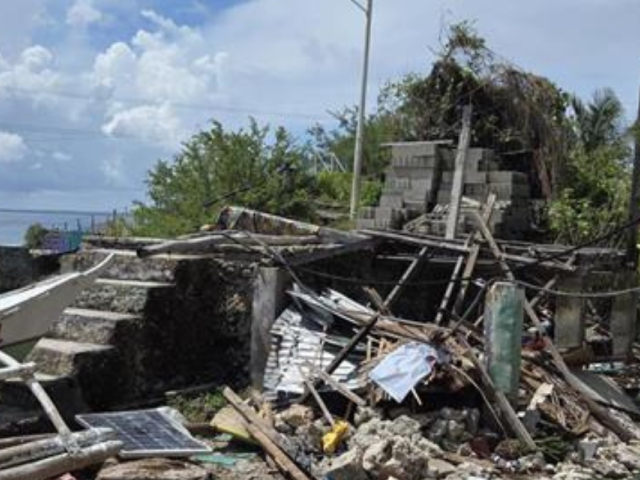 Destroyed buildings near the ocean