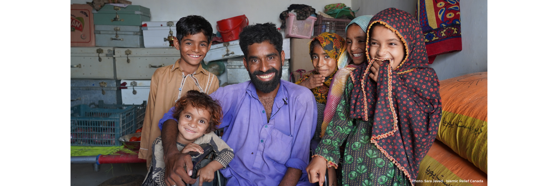 Muhammad in Pakistan with his siblings