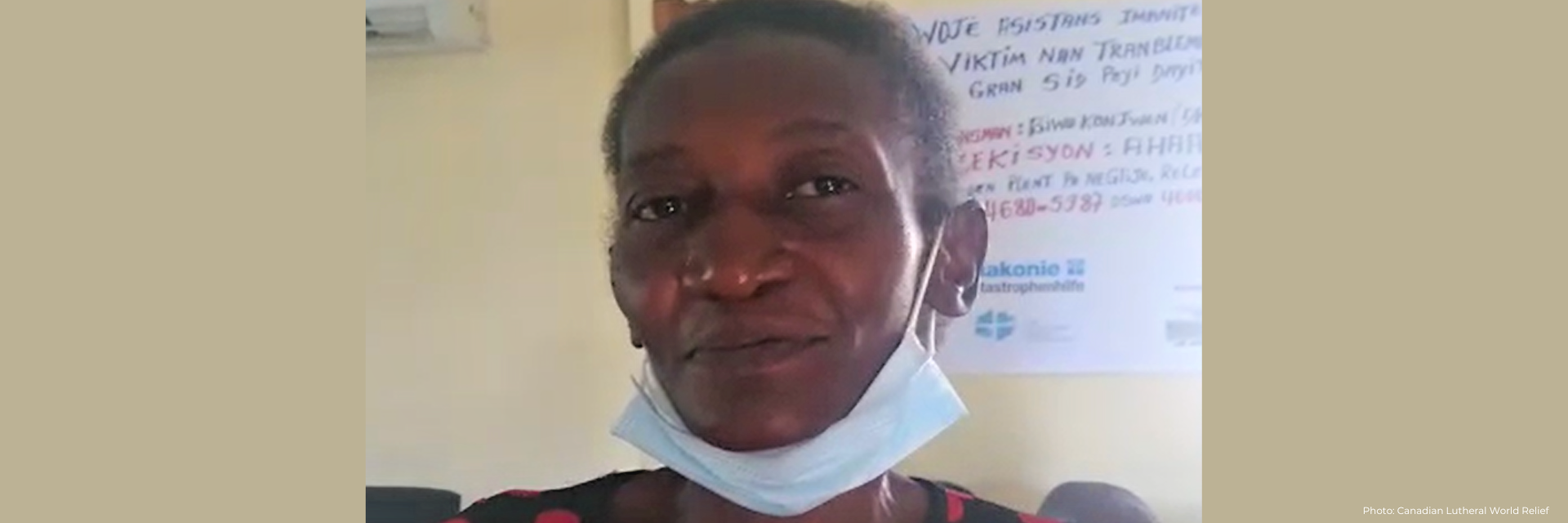 Haitian woman faces camera