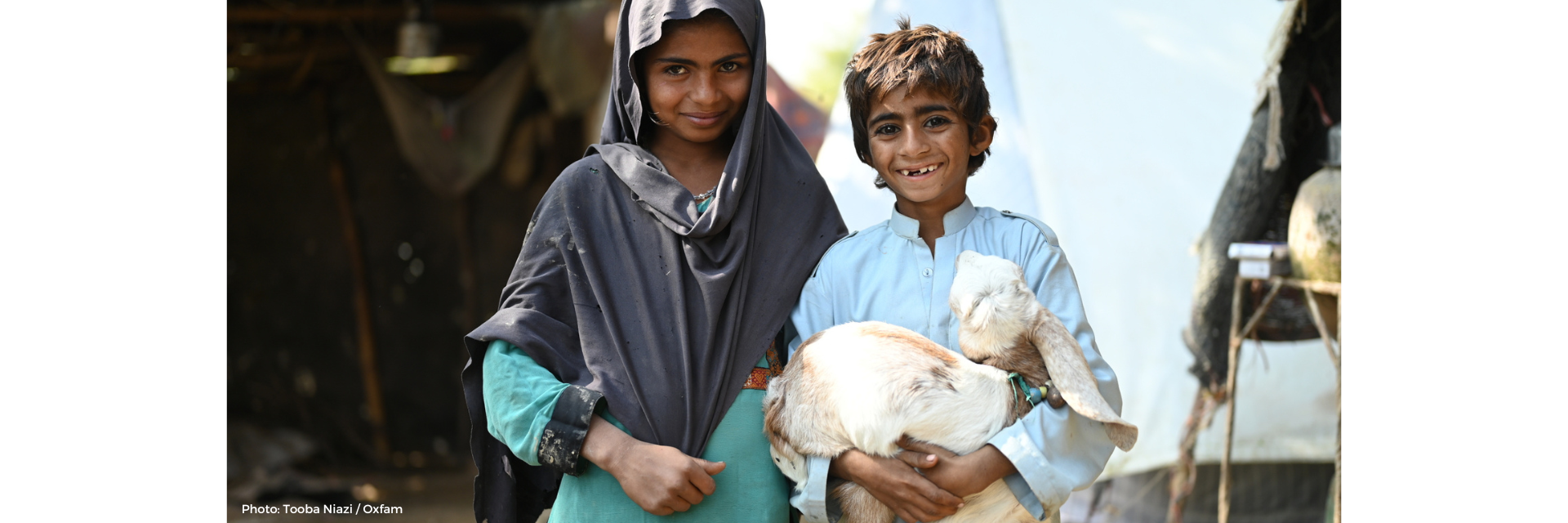 Safoora's children with their baby goat